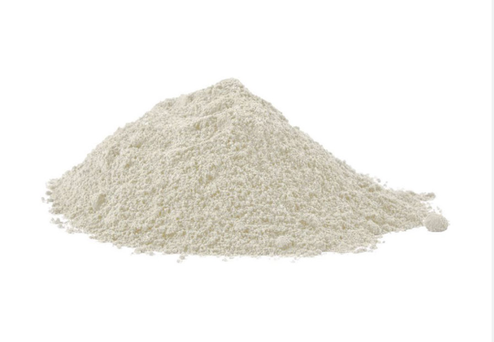 Pile of light-colored powder on a white background